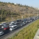 الشرطة تتراجع وتفتح الطريق أمام الحافلات المتوجهّة للأقصى 